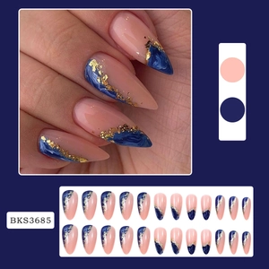 Blue marble french press-on nails set with gold foil accents on a nude base color