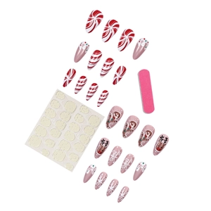Christmas press-on nails set with gingerbread and snowflake patterns on white background
