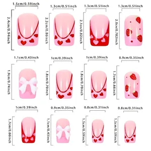 Size chart for strawberry bow press-on nails featuring 12 different nail tip dimensions