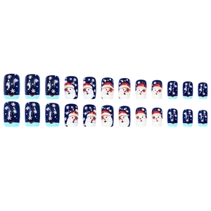 Christmas press-on nails set with blue snowflake and Santa Claus holiday designs