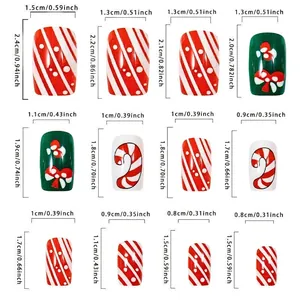 Size chart showing 12 Christmas press-on nails with various festive patterns and dimensions