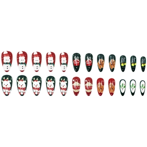 Christmas theme press-on nails featuring red and green almond shapes with festive patterns