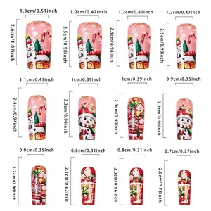 Size chart showing 12 sizes of festive Christmas press-on nails in red and pink tones