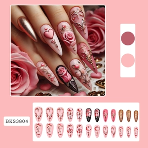 Pink press-on nails set with 3D embossed roses and golden heart accents for women