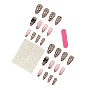 French bow press-on nails with polka dots and pearls including adhesive tabs and file