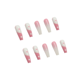 Detail of long coffin press-on nails with pink ombre and gold foil artistic design