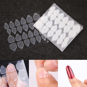 Macro detail of high-adhesion transparent nail glue tabs and application process