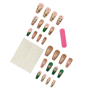Green lucky clover press-on nails set with gold glitter and nail file tools
