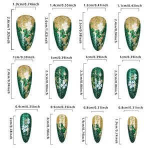 Size chart for Saint Patrick clover press-on nails with lengths and widths in cm/inch