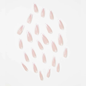 Detail view of 24 pieces long stiletto press-on nails with pink base and white V-French tips
