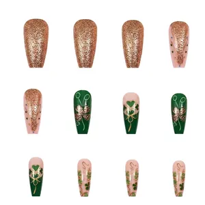 Size chart for 12 sizes of clover press-on nails in gold and green festive styles
