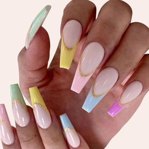 Close-up of long coffin press-on nails with colorful French macaron tips and glitter lines