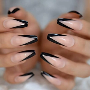 Long ballet press-on nails featuring nude pink base and black V-shaped French tips
