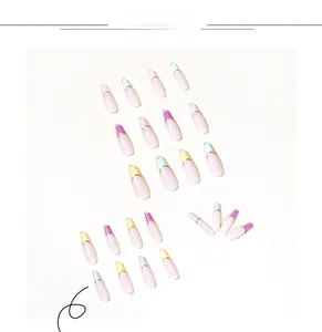 Macro detail of long coffin press-on nails with pastel macaron colors and gold metallic lines