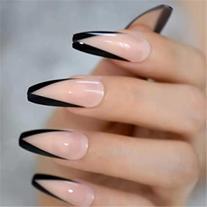 Detailed view of long coffin press-on nails with pink base and black V-shaped French tips