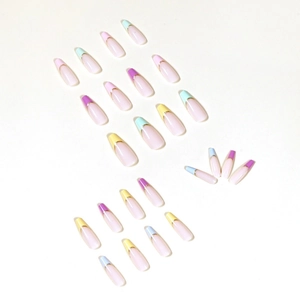 Long French press-on nails with colorful pastel tips and gold outline in coffin shape