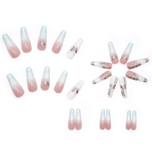 Pink and blue gradient coffin press-on nails with butterfly patterns and small rhinestones