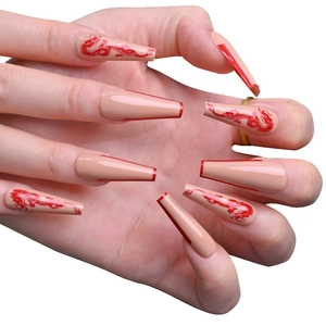 Faux ongles ballerine longs avec motif dragon chinois et bordure French rouge