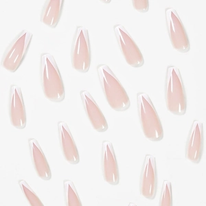 Long coffin press-on nails with nude pink base and elegant white French V-tips