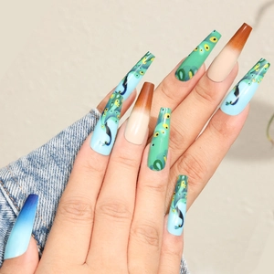Long coffin peacock feather press-on nails with vibrant green and blue gradient finish