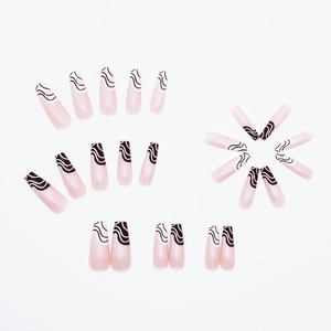Pink press-on nails set with black wave patterns and coffin shape ballerina style