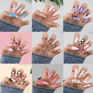 Detailed grid of mid-length almond press-on nails featuring marble and leopard patterns
