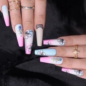Long coffin fake nails with floral art, blue-pink gradient and crystal rhinestone accents