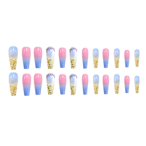 Long trapezoid press-on nails with pink-blue gradient, gold foil, and multi-color rhinestones