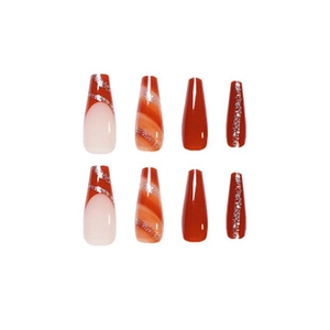 Macro shot of orange marble and silver glitter almond press-on nails set of eight pieces