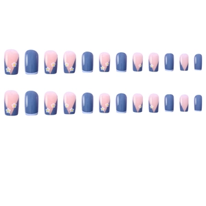 Short French style press-on nails in blue and pink with elegant white flower designs
