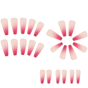 Detail view of pink purple gradient coffin shaped press-on nails with a matte texture