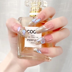 Pink gradient coffin press-on nails with silver glitter and iridescent rhinestones
