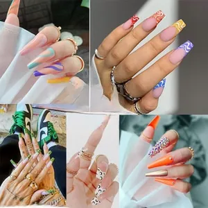 Detailed views of almond press-on nails featuring rainbow swirls and moon nail art designs