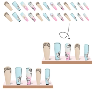 Long coffin fake nails with floral patterns, rhinestone accents, and blue gradient finish