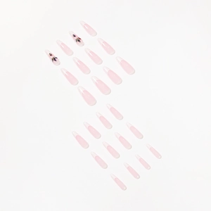 French tip press-on nails in long ballerina shape with pink base and butterfly rhinestones
