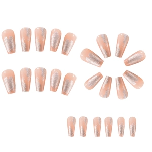 Silver glitter nude pink press-on nails in medium coffin shape set on white background