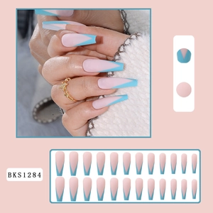 Pink matte coffin press-on nails with blue V-shaped french tips for women manicure