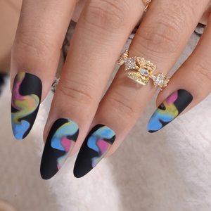 Matte black almond press-on nails with colorful smoke marble pattern for women