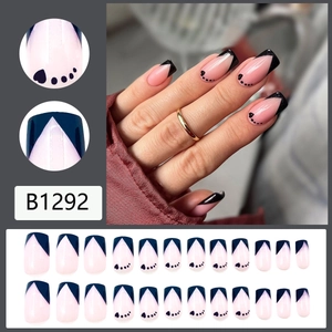 French tip heart press-on nails in black and pink, medium length square coffin shape