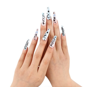Pink and blue gradient coffin press-on nails with black snake and star moon patterns