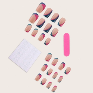 French press-on nail set with 24 pieces in pink and blue geometric patterns with tools