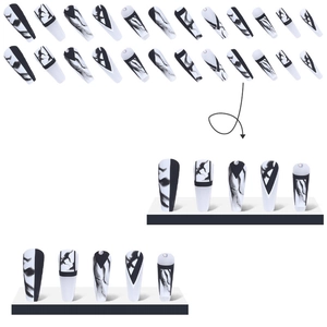 Black and white long coffin press-on nails with marble texture and rhinestone details