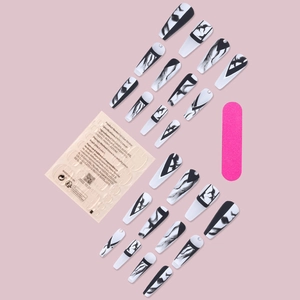 Long coffin press-on nails set with black marble ink design and 24 jelly glue stickers