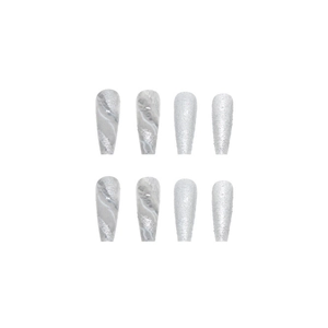 Detail of grey marble pattern and silver glitter ballerina shape press-on nails