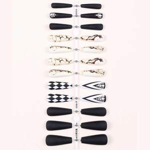 Matte press-on nails set featuring rose patterns, marble textures, and rhinestones
