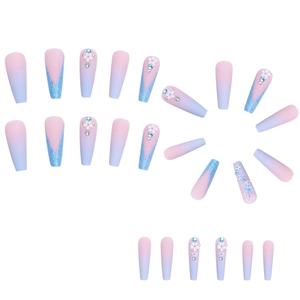 Matte pink and blue gradient press-on nails with 3D white flowers and diamond accents