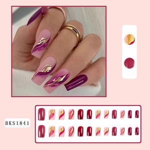 Purple gold leaf marble press-on nails set in long coffin shape with full kit display