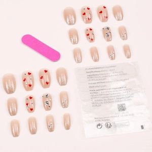 Sparkling heart press-on nail set with silver glitter and rhinestone details