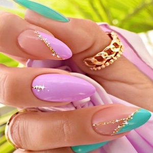 Waterdrop almond press-on nails with lavender purple, mint green and gold star designs