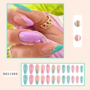 Almond shaped press-on nails in blue, pink, and purple with gold glitter star patterns